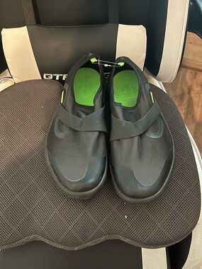 OOFOS Black Slip-On with Green Insole Accent